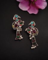 Colorful Indian jewelry earrings with intricate peacock design, gemstones, and pearl accents, perfect for traditional festive wear, from Kurabels Indian fashion jewelry collection.