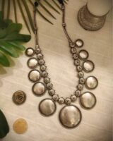 Sterling silver traditional Indian jewelry necklace with large pearl accents and floral designs, perfect for ethnic occasions and festive wear. Stunning statement piece from Kurabels.