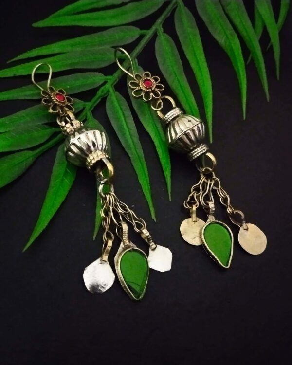 Delicate Indian silver earrings with green enamel accents and intricate floral and dangling charm design, perfect for traditional Indian jewelry collection.