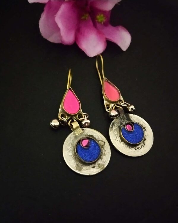 Colorful Indian boho earrings with pink, blue, and silver accents, perfect for traditional or contemporary Indian fashion jewelry styling.