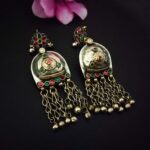 Intricate Indian traditional silver earrings with colorful enamel and dangling chains, perfect for festive occasions and showcasing ethnic jewelry styles.