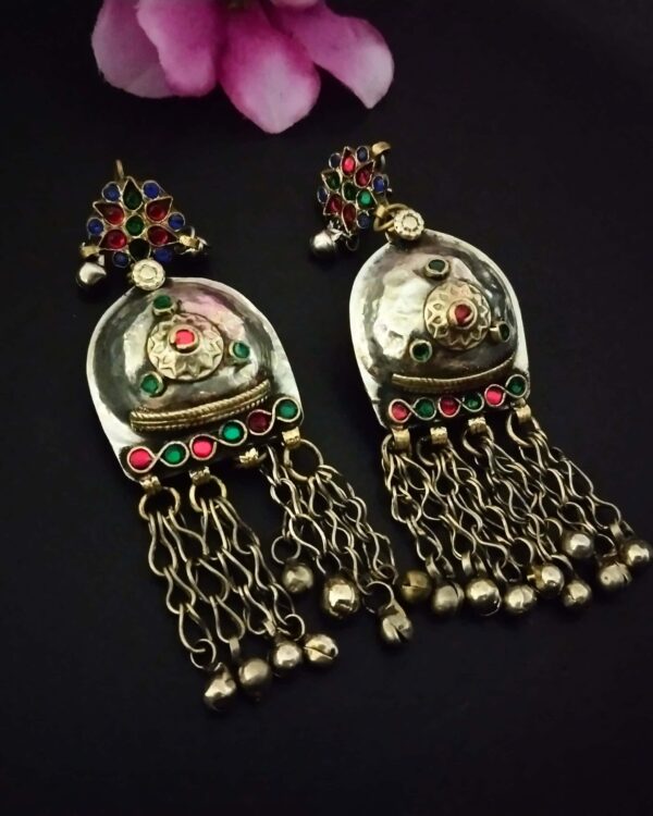 Intricate Indian traditional silver earrings with colorful enamel and dangling chains, perfect for festive occasions and showcasing ethnic jewelry styles.