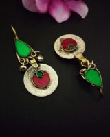 Colorful Indian ethnic earrings featuring green and red enamel details, intricate silver and gold-tone design, perfect for traditional jewelry and fashion accessories.
