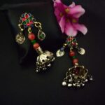 Colorful traditional Indian jewelry, oxidized silver earrings with beads and charms, perfect for ethnic fashion and jewelry collection.