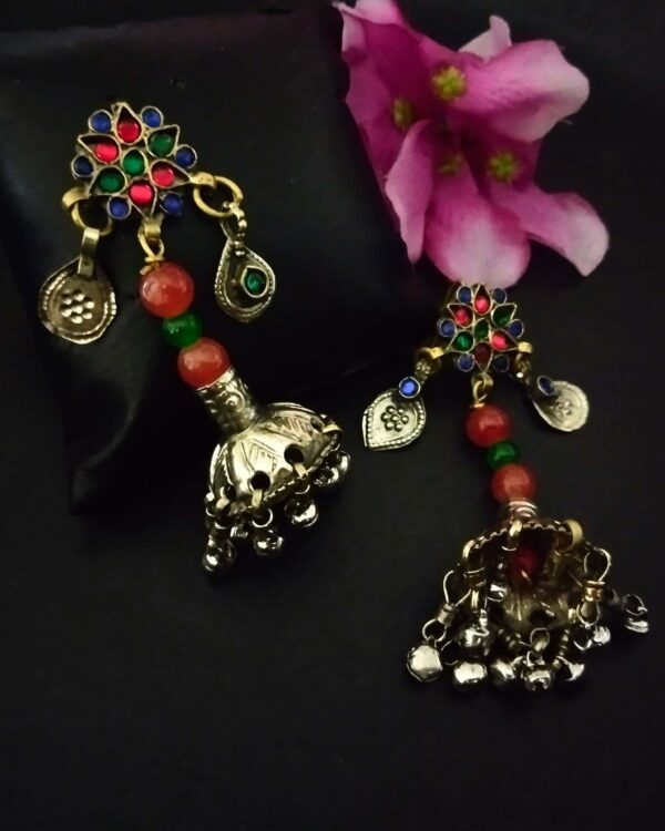 Colorful traditional Indian jewelry, oxidized silver earrings with beads and charms, perfect for ethnic fashion and jewelry collection.