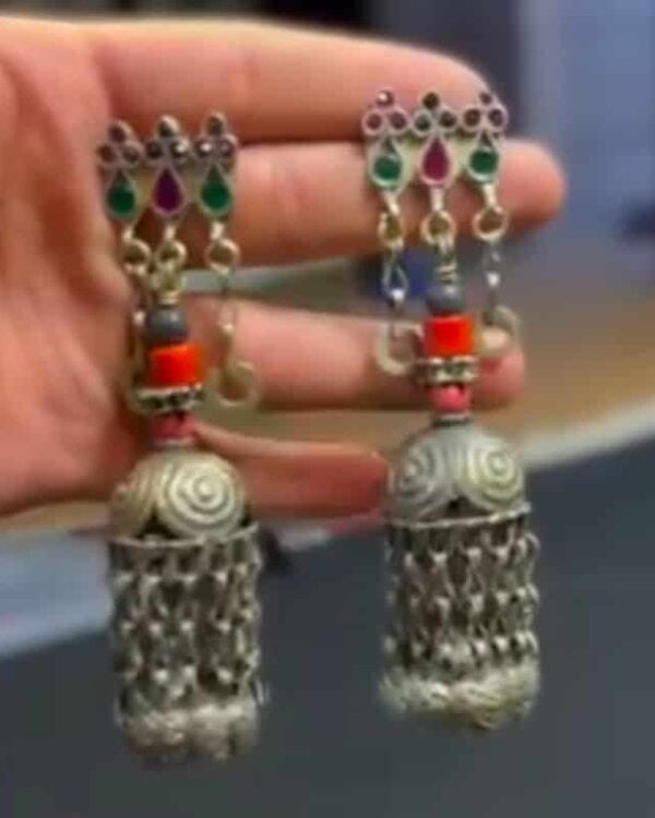 Oxidized silver jhumka earrings with multicolored beads and intricate design for traditional Indian jewelry lovers.