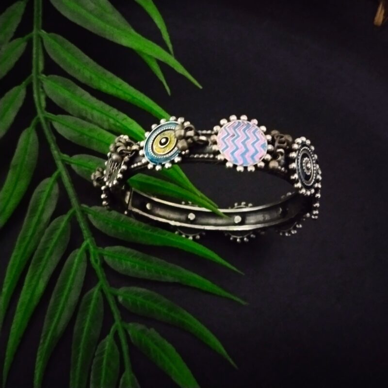 Colorful Indian Bohemian style oxidized silver bracelet with pastel pink, blue, and yellow accents, handcrafted jewelry for women, perfect for ethnic or casual fashion.