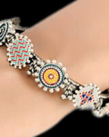 Colorful Indian ethnic jewelry bracelet with traditional patterns and embellishments, perfect for ethnic wear and cultural occasions. Handcrafted and vibrant, ideal for fashion jewelry lovers.