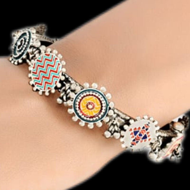 Colorful Indian ethnic jewelry bracelet with traditional patterns and embellishments, perfect for ethnic wear and cultural occasions. Handcrafted and vibrant, ideal for fashion jewelry lovers.