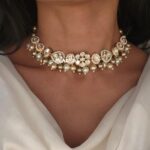 Luxurious pearl and crystal Indian jewelry necklace designed for elegant occasions, featuring intricate craftsmanship and timeless style. Perfect for traditional and contemporary Indian fashion statements.