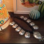 Intricate Indian silver tribal necklace with multiple pendant charms, black bead accents, traditional jewelry design, perfect for ethnic fashion and festive occasions.