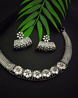 Antique silver floral jewelry set with necklace and earrings, traditional Indian oxidized jewelry design, perfect for festive or ethnic occasions.