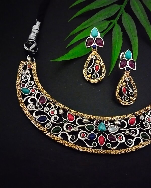 Silver and gold-plated jewelry set with colorful semi-precious stones, traditional Indian necklace and earrings, exquisite designer jewelry, perfect for festive and special occasions.