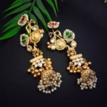Gold plated traditional Indian earrings with pearl and colored stone embellishments perfect for festive occasions and weddings.