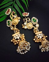 Gold plated traditional Indian earrings with pearl and colored stone embellishments perfect for festive occasions and weddings.