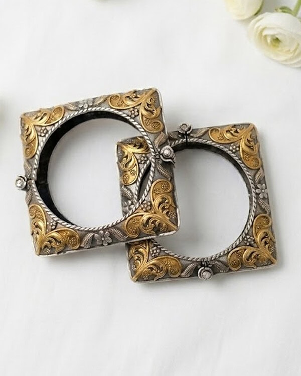 Vintage Indian jewelry buckles with intricate gold and silver detailing, perfect for traditional and contemporary fashion accessories.