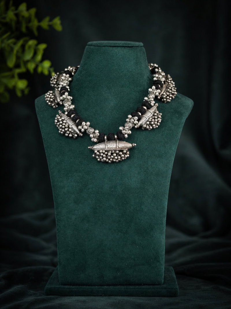 Elegant Indian Silver Jewelry Necklace. Beautiful handcrafted Indian silver jewelry necklace with intricate beadwork and traditional design, perfect for festive occasions and cultural celebrations.